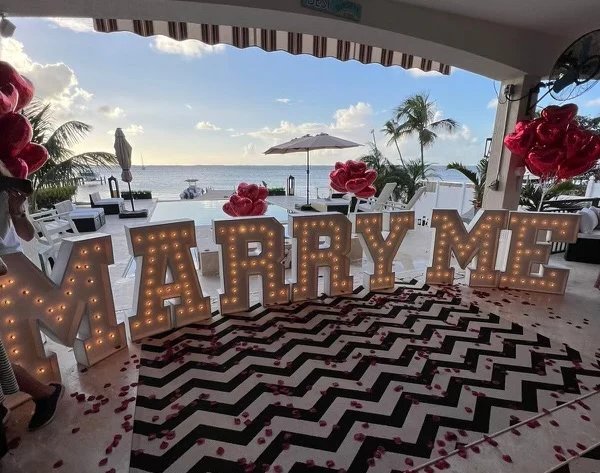 MARRY ME white marquee letters with warm bulbs