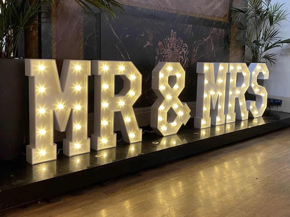 MR and MRS white marquee letters with warm bulbs