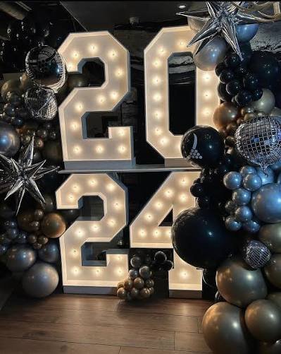 20 and 24 white marquee numbers with balloon decor