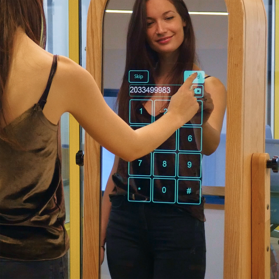 Email and SMS sharing on mirror booth